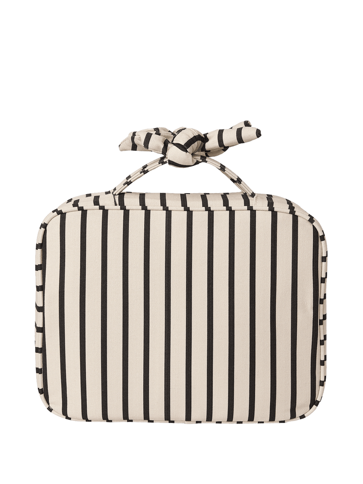 Black and white striped travel cosmetic case with a bow