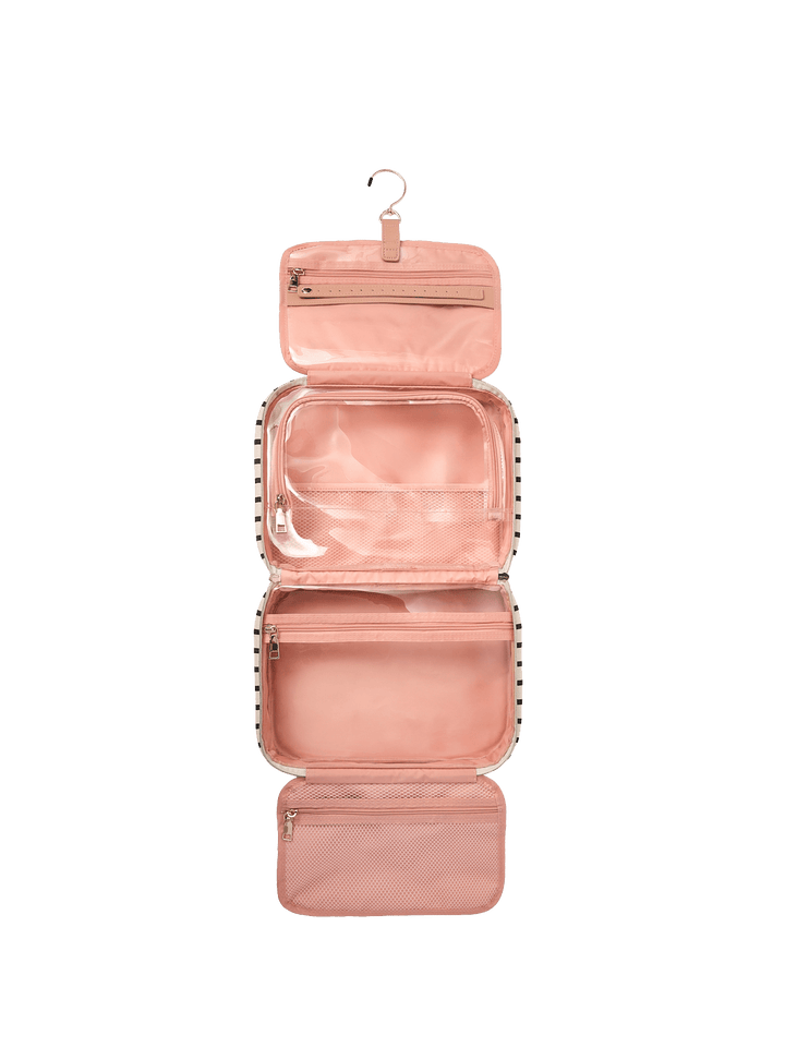 Pink hanging travel organizer with multiple compartments