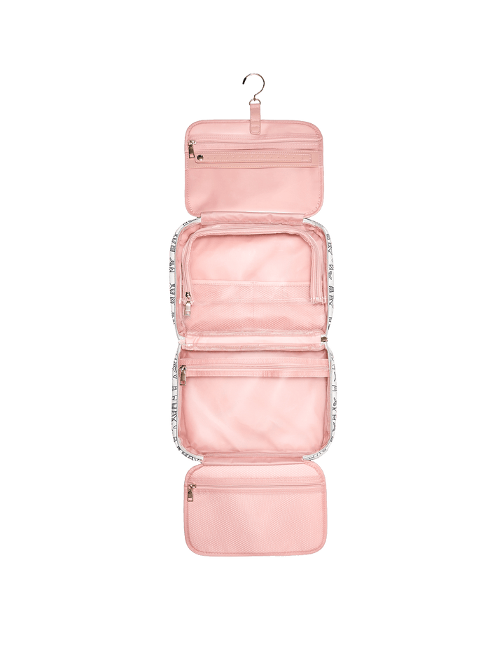 Pink hanging travel organizer with multiple compartments