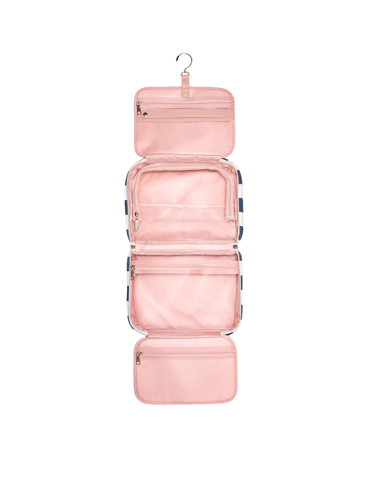 Pink hanging travel organizer with multiple compartments 