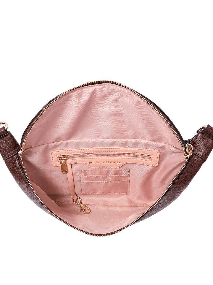 Interior of The Large Sidekick in Espresso showing card slots, zip pocket, and key leash