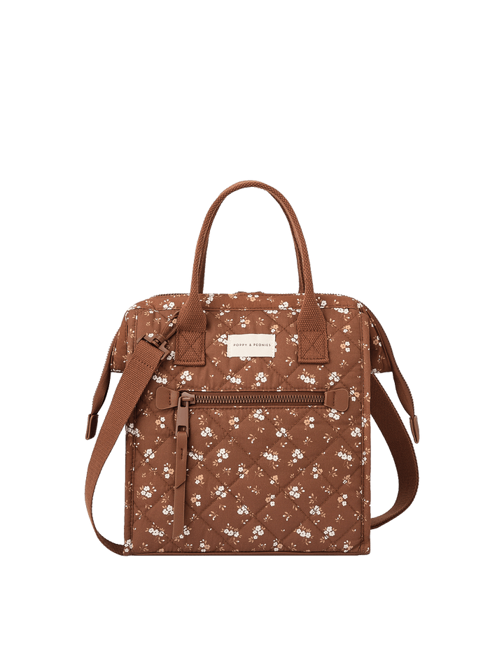 The Lunch Bag in Brown Floral with adjustable crossbody strap and front zip pocket