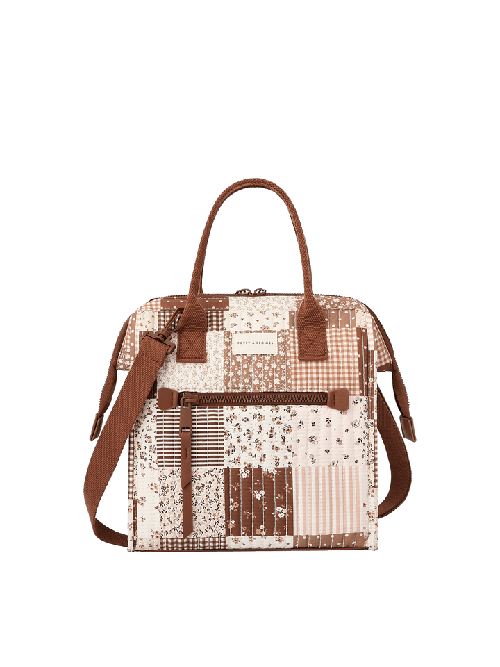 The Lunch Bag in Brown Patchwork with adjustable crossbody strap and front zip pocket