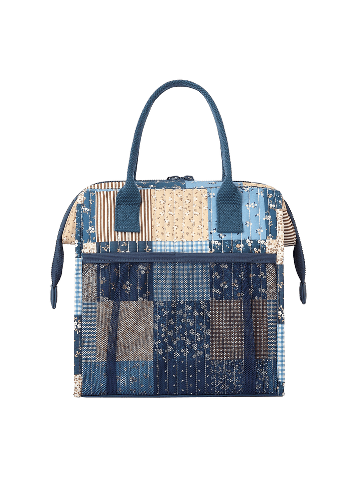 Back view of The Lunch Bag in Navy Patchwork with rear mesh water bottle pocket