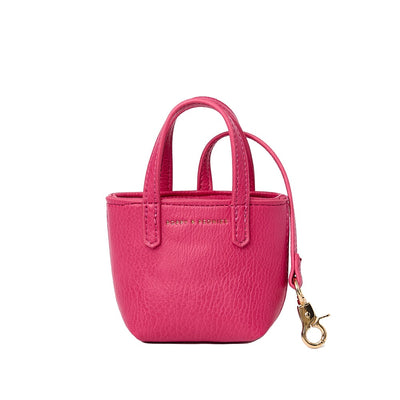A micro tote bag charm in pink