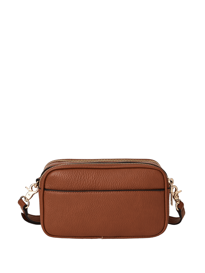 Brown vegan leather crossbody bag on a transparent background