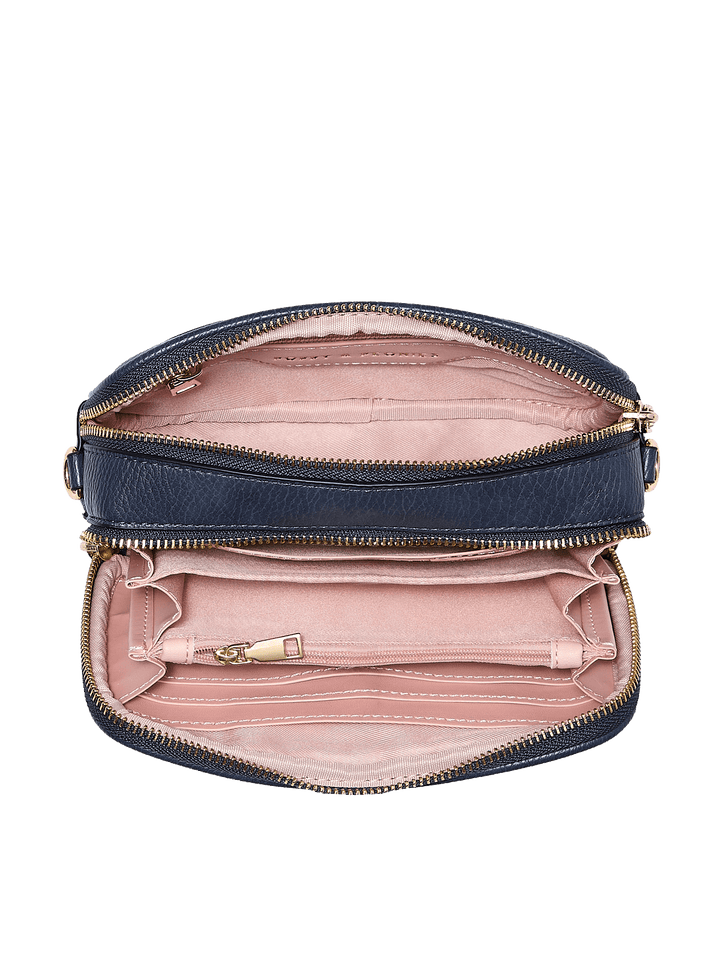 Navy blue crossbody bag with pink interior 