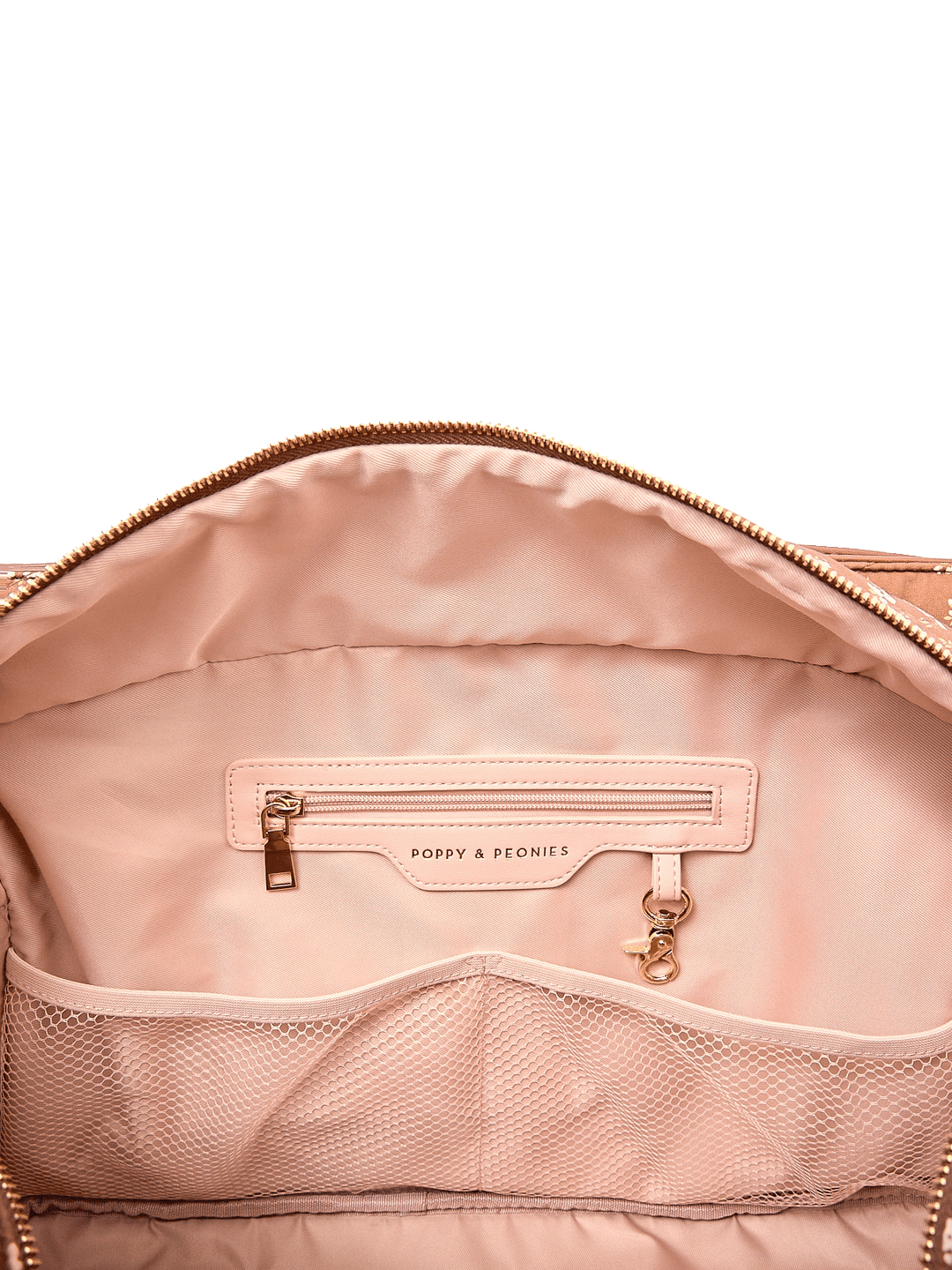 Interior zip pocket and mesh organizer pockets inside Mini Voyager tote in Brown Floral