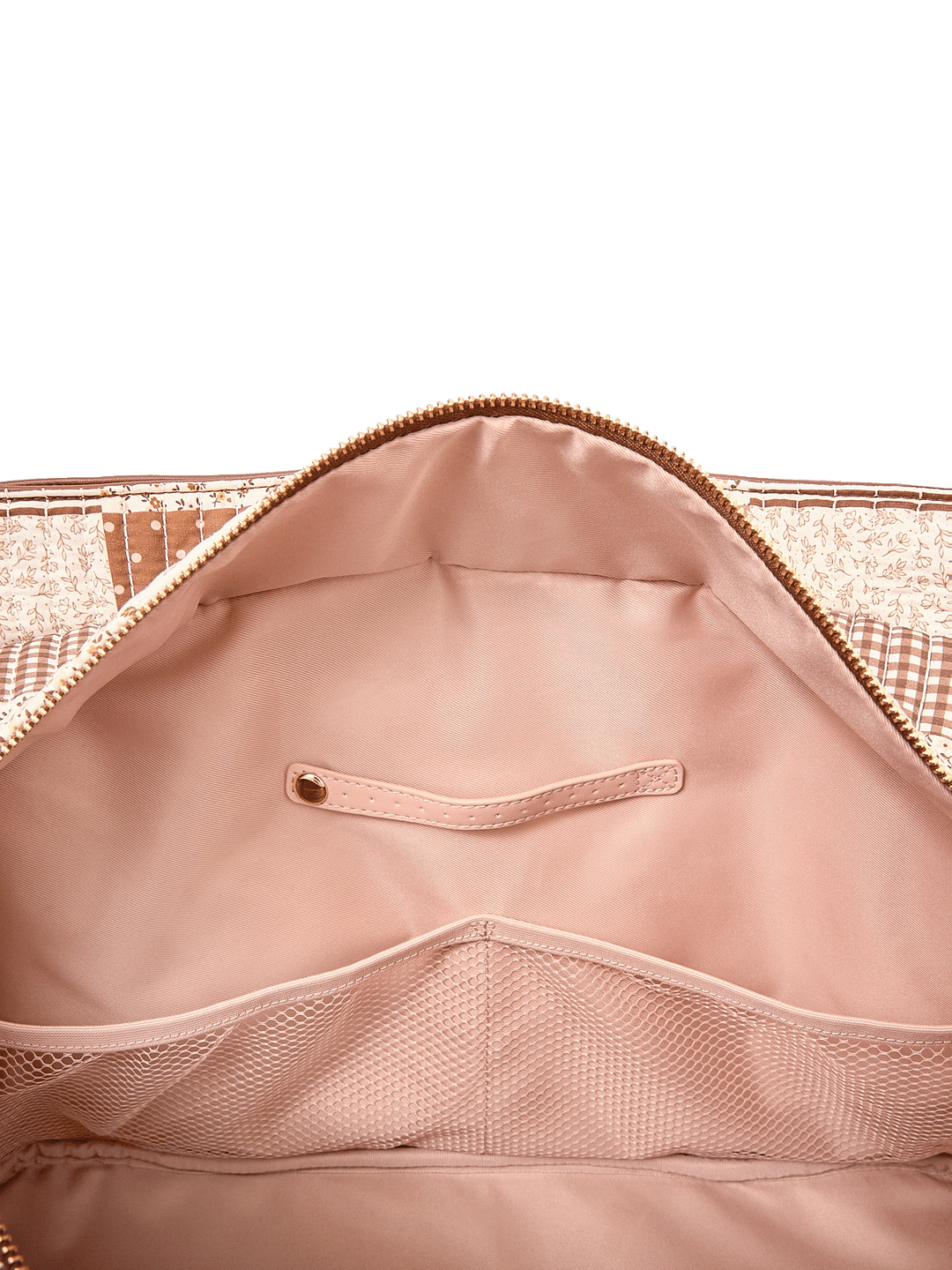 Interior slide pocket and jewelry tab inside Mini Voyager tote in Brown Patchwork