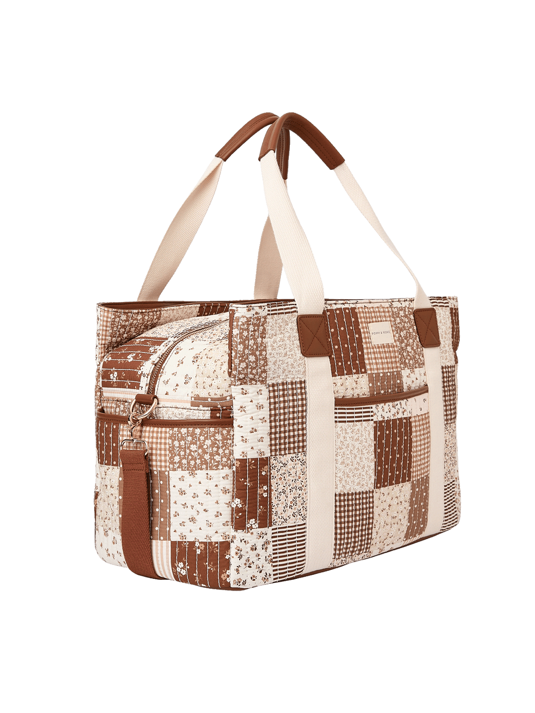Angled side view of Mini Voyager tote in Brown Patchwork