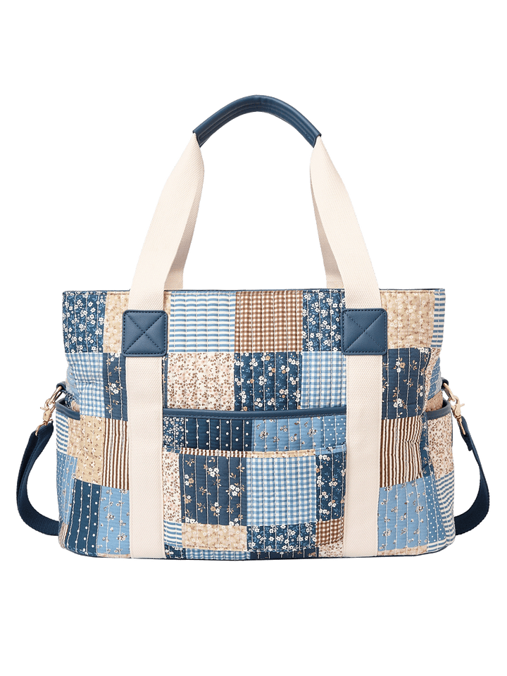 Back view of Mini Voyager tote in Navy Patchwork with trolley sleeve