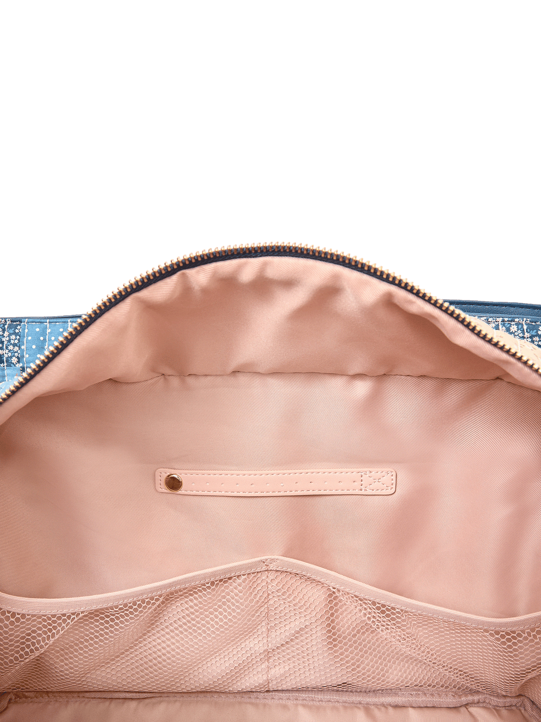 Interior slide pocket and jewelry tab inside Mini Voyager tote in Navy Patchwork
