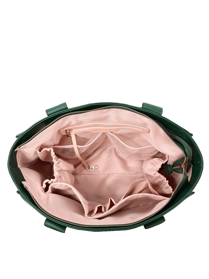 Interior of Multitasker tote in Heritage Green showing laptop compartment, cup holders, and organizer pockets