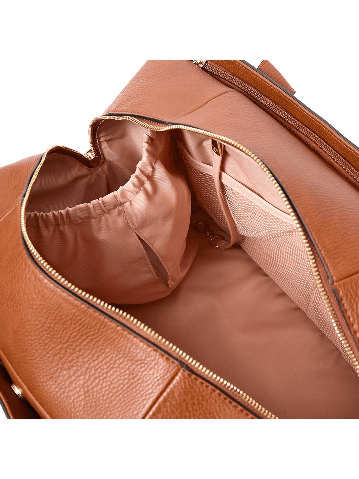 Close-up of a brown vegan leather bag with an interior cup holder