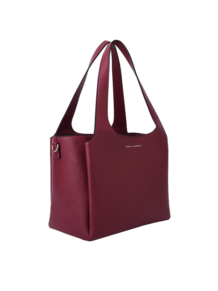 Poppy & Peonies The Companion Tote in Berry angled side view, highlighting the structured shape, top handles and spacious profile.