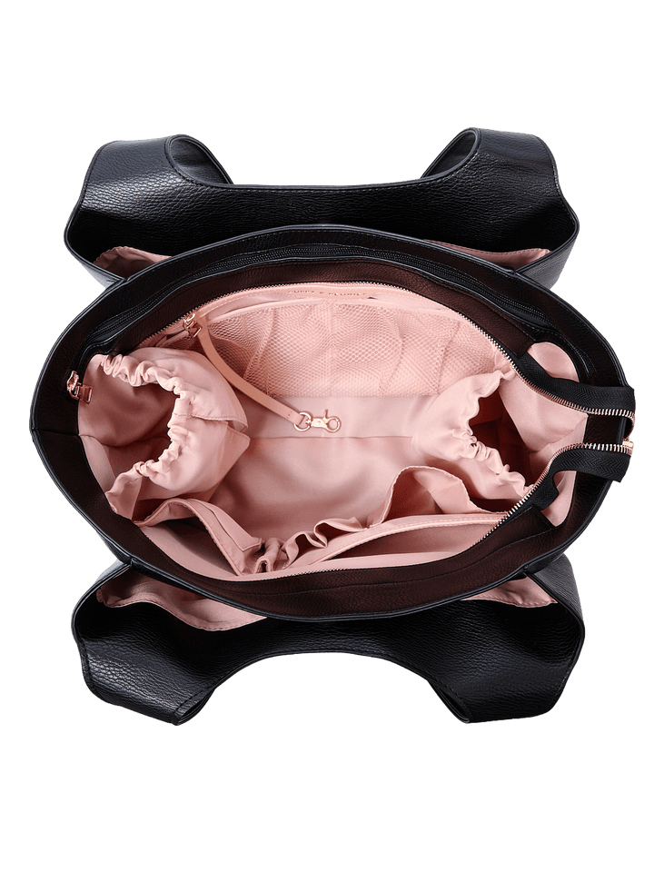 Poppy & Peonies The Companion Tote in Black open top view, showcasing the spacious blush-pink interior with cupholder and multiple organizational pockets.
