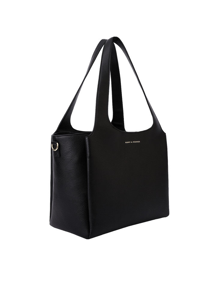 Poppy & Peonies The Companion Tote in Black angled side view, highlighting its spacious depth, structured shape and top handles.