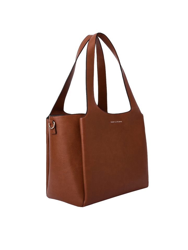 Poppy & Peonies The Companion Tote in Chestnut angled side view, highlighting the structured shape, roomy depth and top handles.