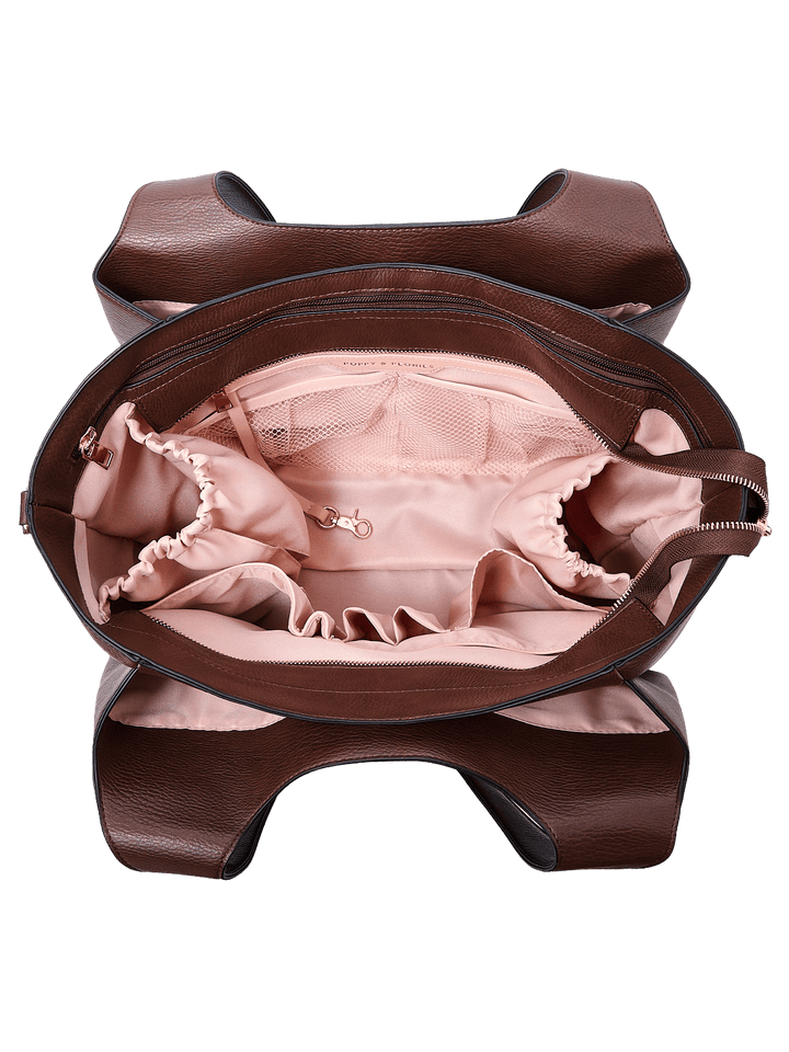 Poppy & Peonies The Companion Tote in Espresso open top view, showcasing the blush-pink lined interior with multiple organizational compartments.