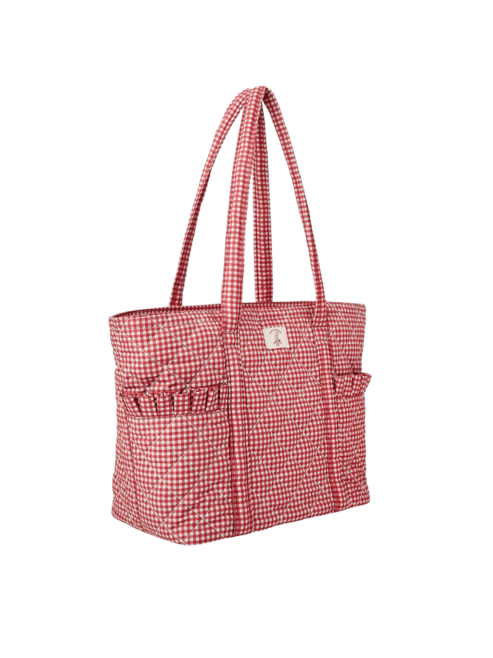 Poppy & Peonies Analog Tote in Heart Berry Gingham angled side view, featuring ruffled exterior side pockets and long shoulder straps.
