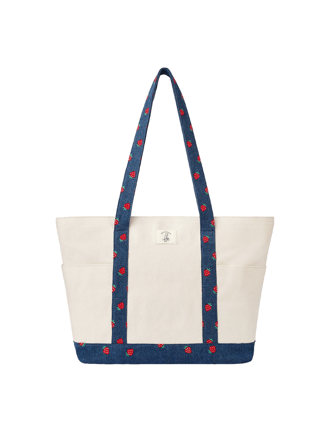Poppy & Peonies Analog Tote in Strawberry Denim, featuring a spacious cream canvas body, denim shoulder straps with embroidered red strawberry motifs, and a matching strawberry denim base for a playful, casual look.