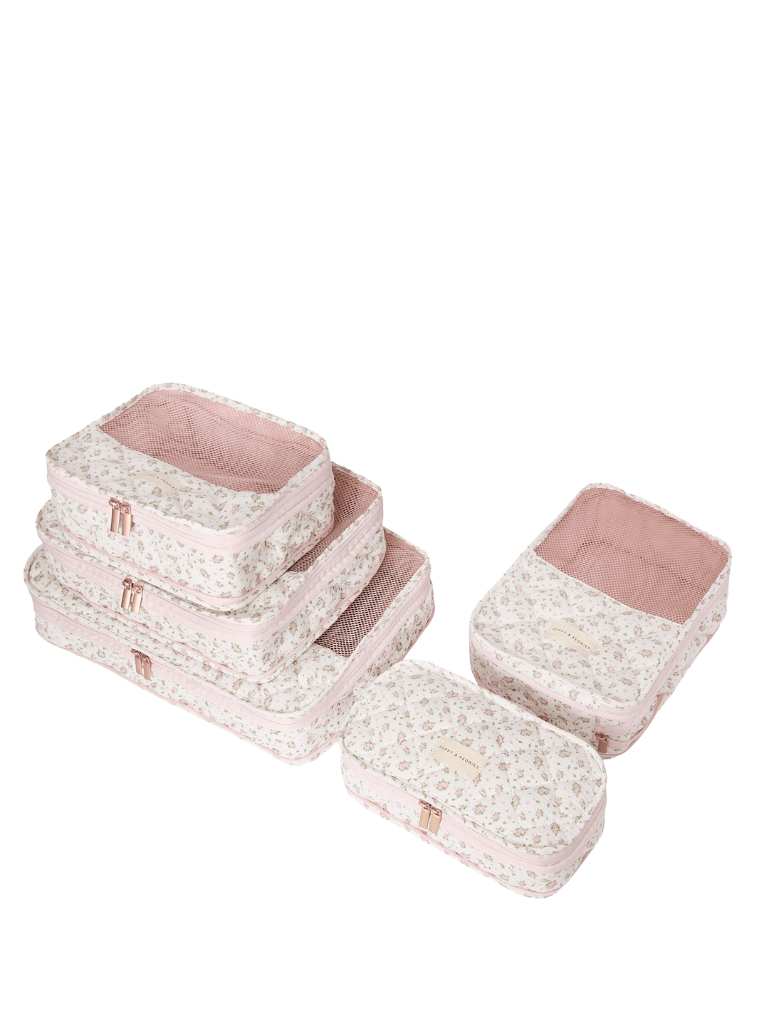 Set of pink and white floral-patterned packing cubes