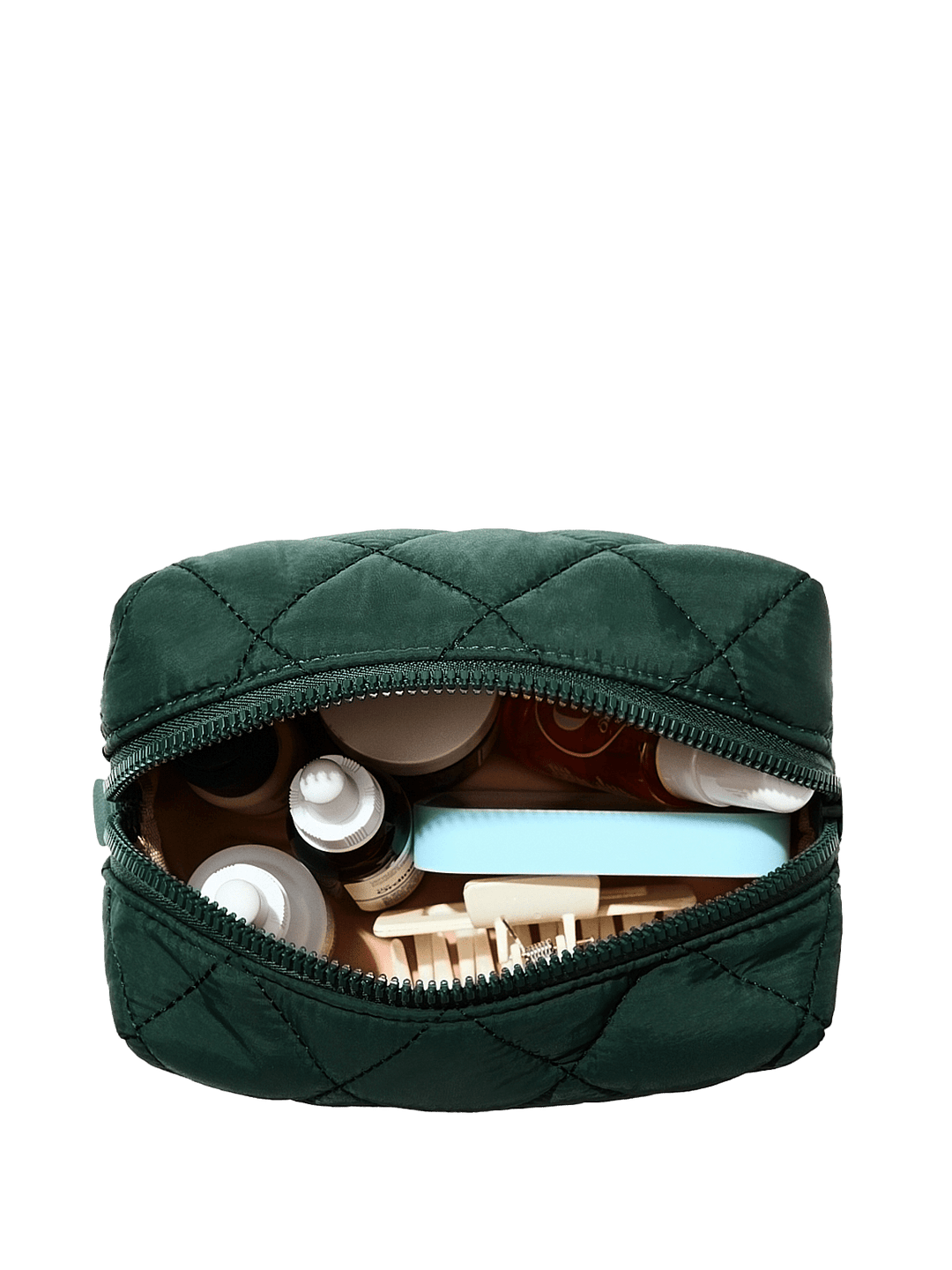 Green quilted cosmetic bag with toiletries on a transparent background