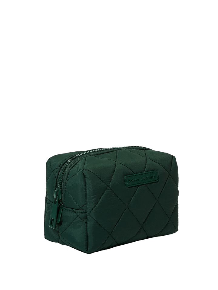 Green quilted cosmetic bag on a white background
