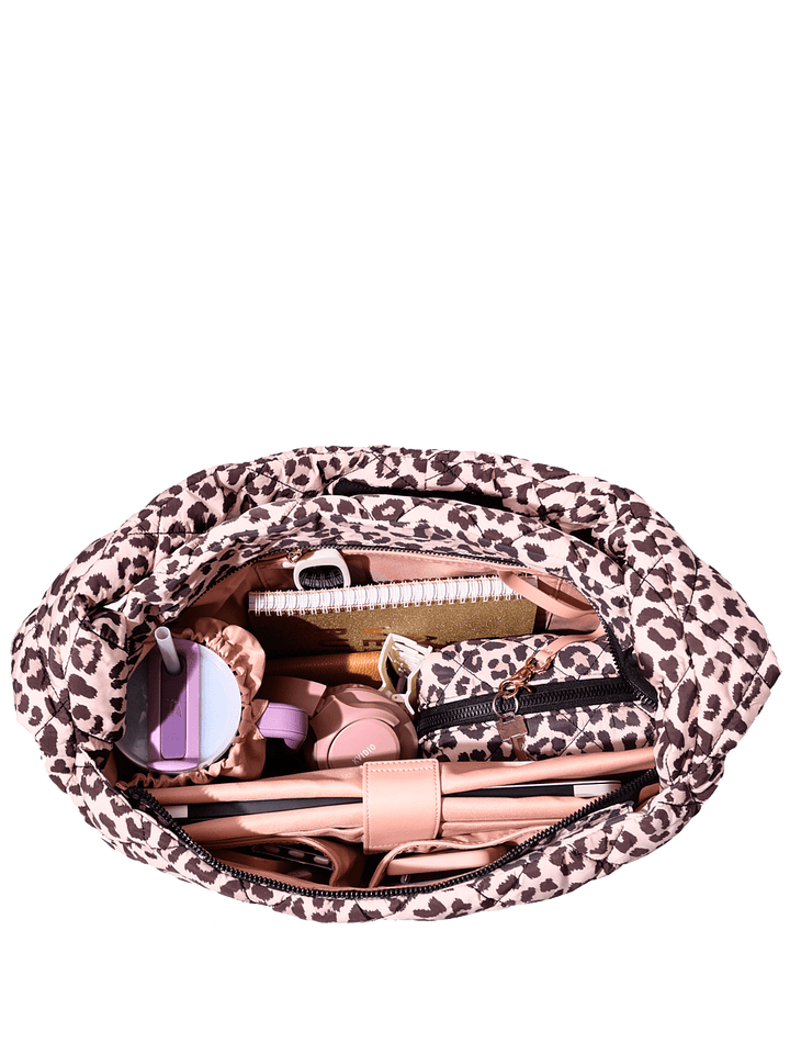 Interior of a quilted leopard print hobo bag 