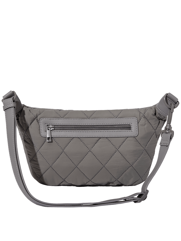 Grey quilted handbag with a strap on a transparent background