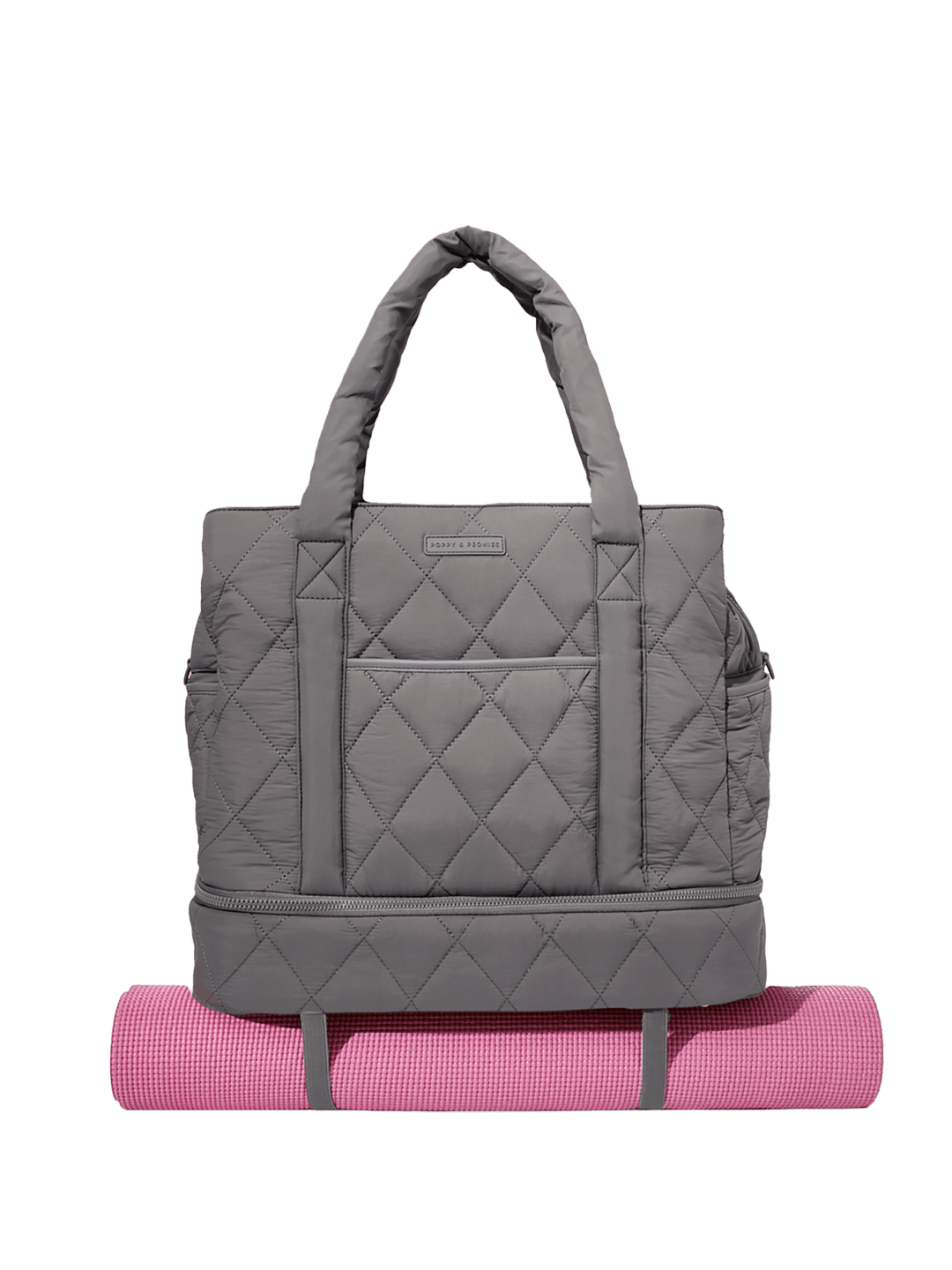 Grey quilted travel bag with pink yoga mat on a transparent background