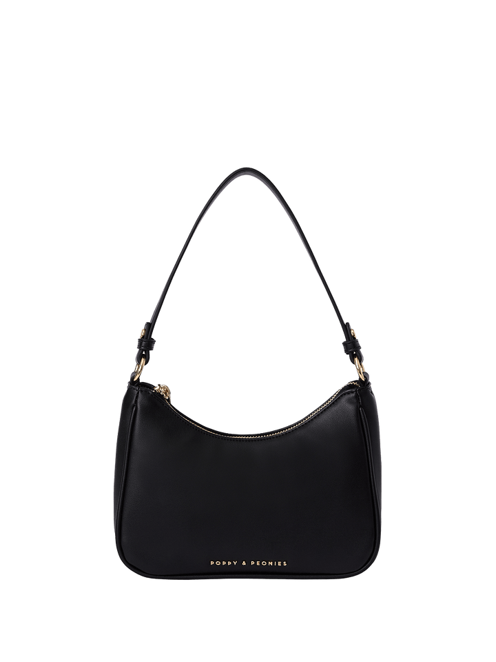 Black handbag with a visible brand logo on a transparent background