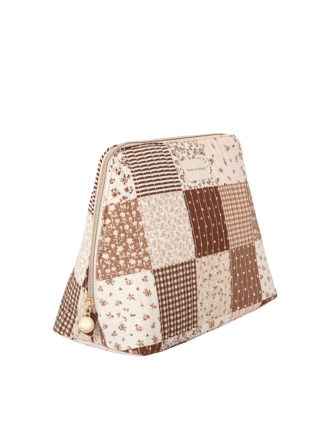 Angled side view of the Sitting Pretty Cosmetic Case in Brown Patchwork