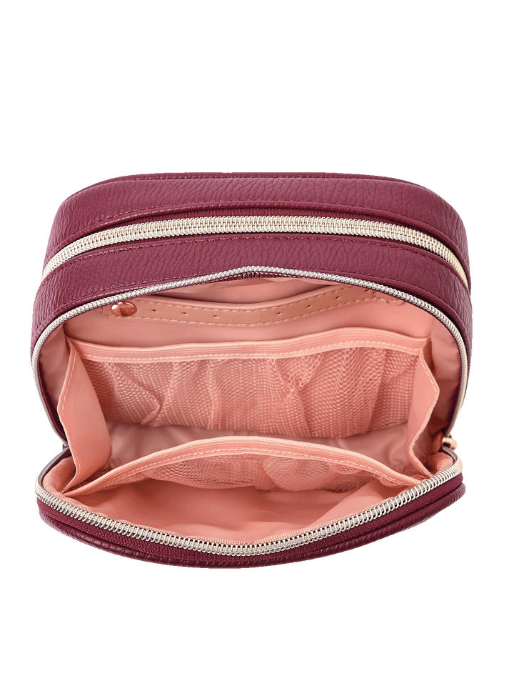 Pretty Connected Case in Berry opened to show cosmetic compartment with jewelry tab and mesh pockets