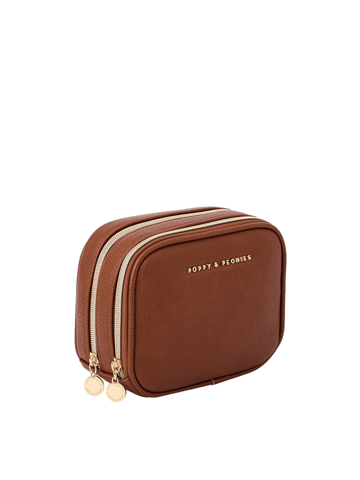 Angled side view of Pretty Connected Case in Chestnut showing dual zip compartments