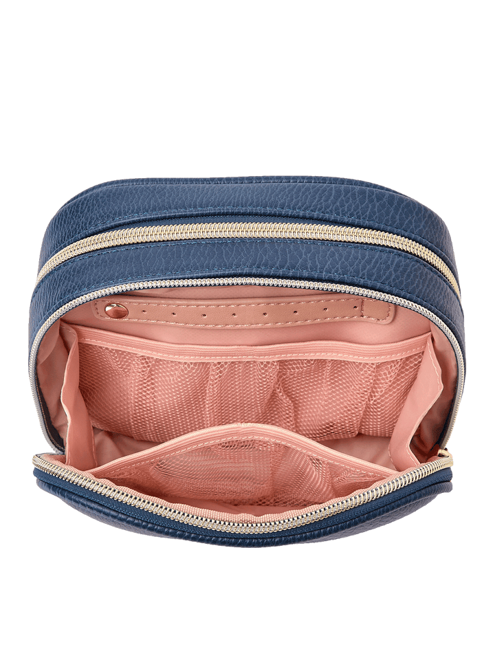 Pretty Connected Case in Navy opened to show cosmetic compartment with jewelry tab and mesh pockets