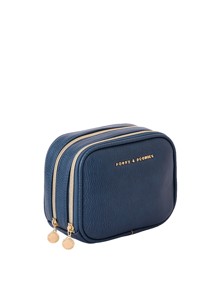 Angled side view of Pretty Connected Case in Navy showing dual zip compartments
