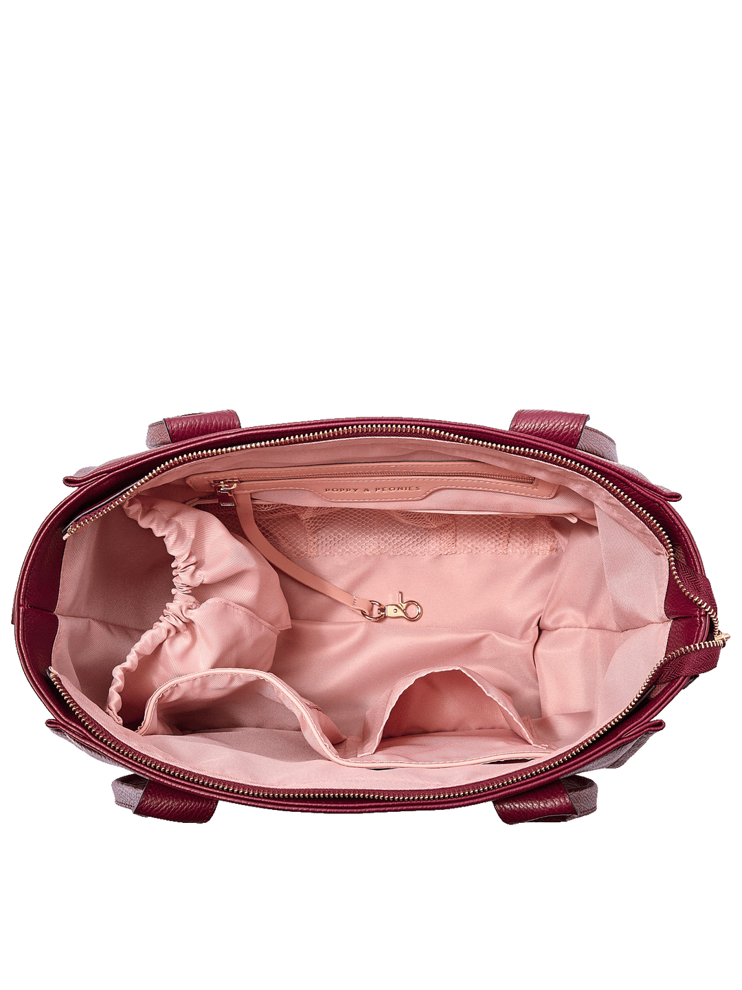 Interior of the Small Multitasker in Berry showing cup holder and organization pockets