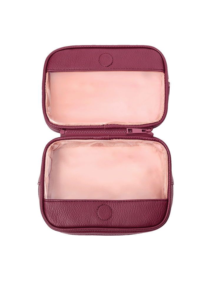 The Split Organizer in Berry fully unzipped to display both compartments
