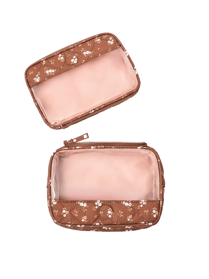 The Split Organizer in Brown Floral with compartments separated for individual use
