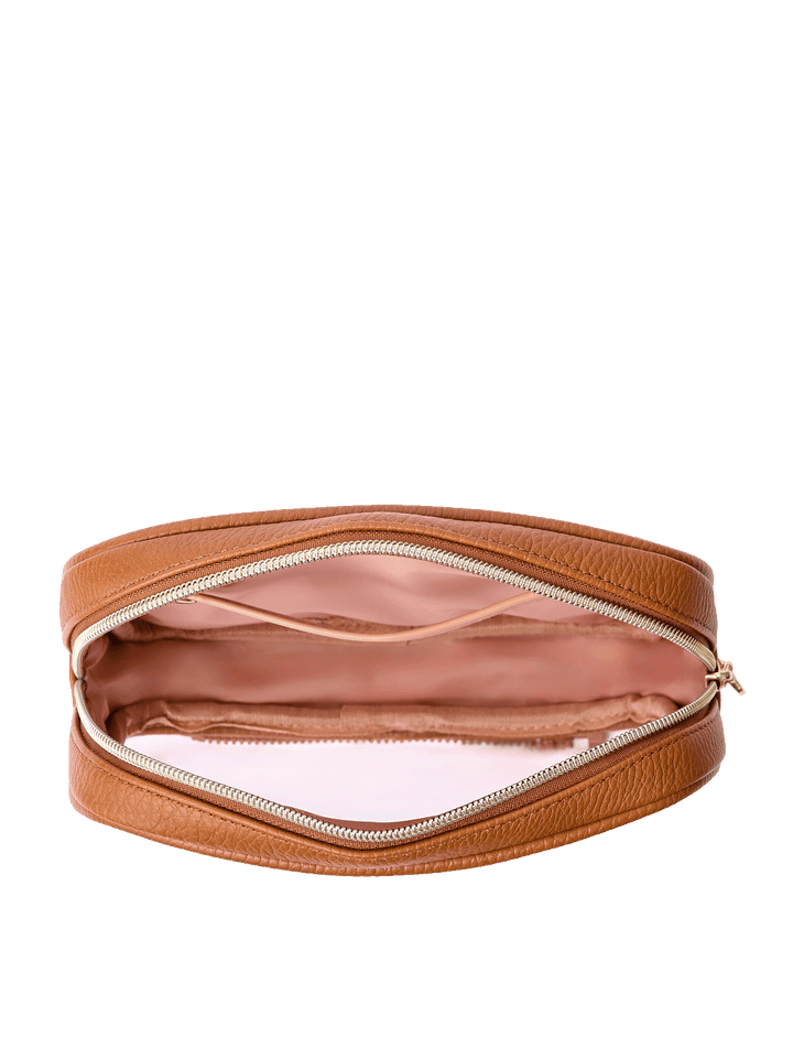 Open view of The Split Organizer in Cognac showing wipeable interior and jewelry tab