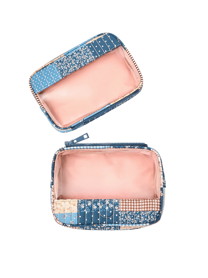 The Split Organizer in Navy Patchwork with compartments separated for individual use