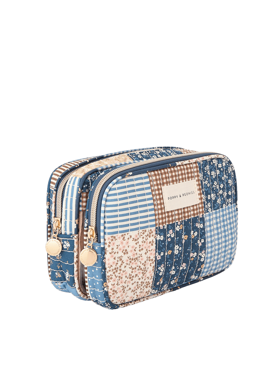Angled side view of The Split Organizer in Navy Patchwork showing dual compartments