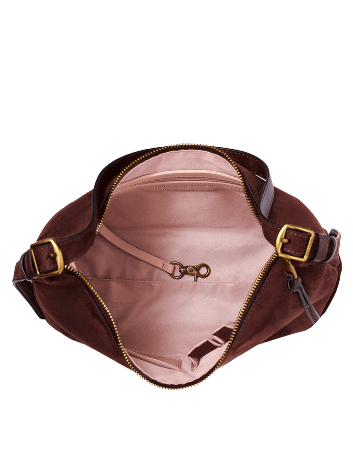 Poppy & Peonies The Sunday Bag in Espresso Suede open top view, showcasing the blush-pink lined interior, interior zippered pocket, key clip and slip pocket.