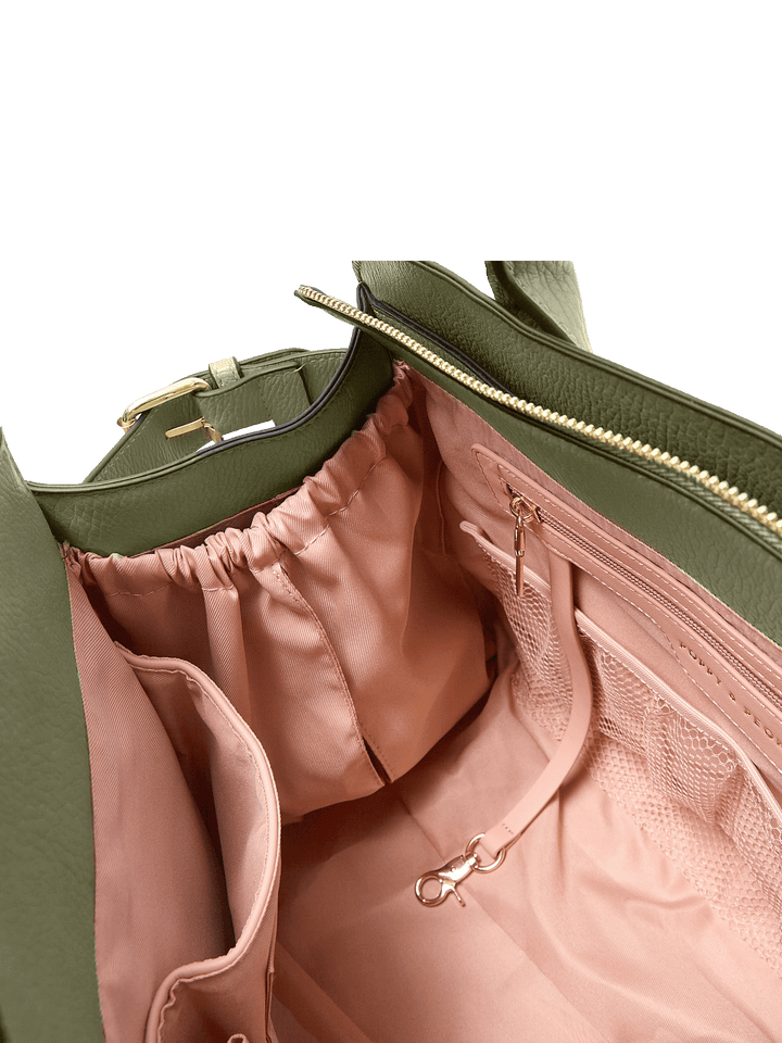 Interior of the Uptown Tote in Olive showing mesh pockets, zip pocket, key leash, and organized compartments