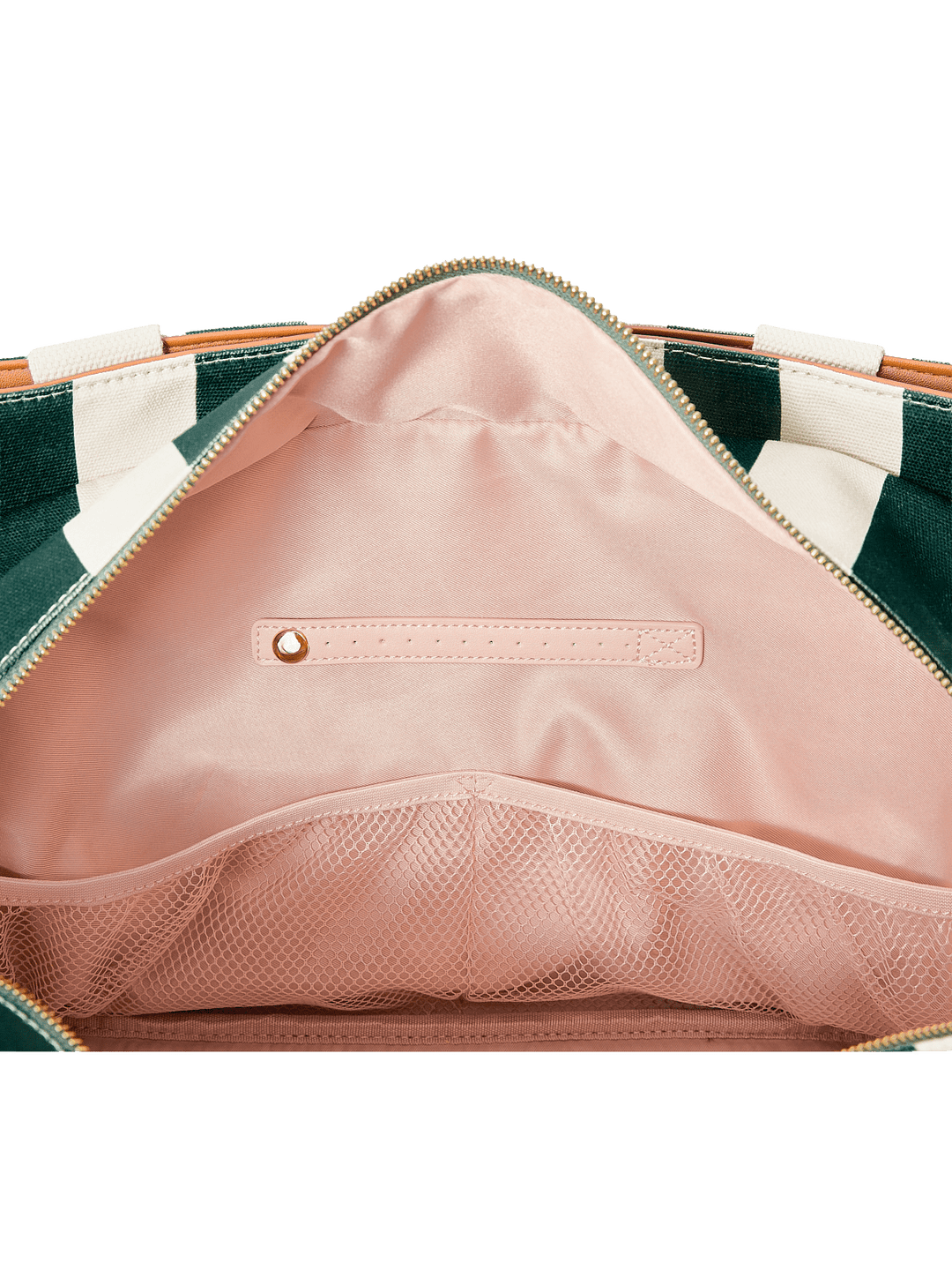 Close-up of a pink interior pocket on a green and white striped bag.