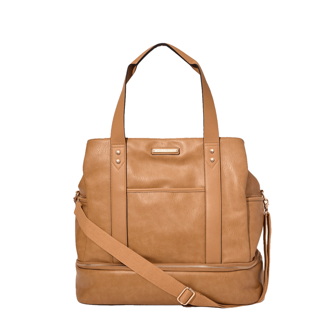 Brown vegan leather travel bag with a shoulder strap and crossbody strap