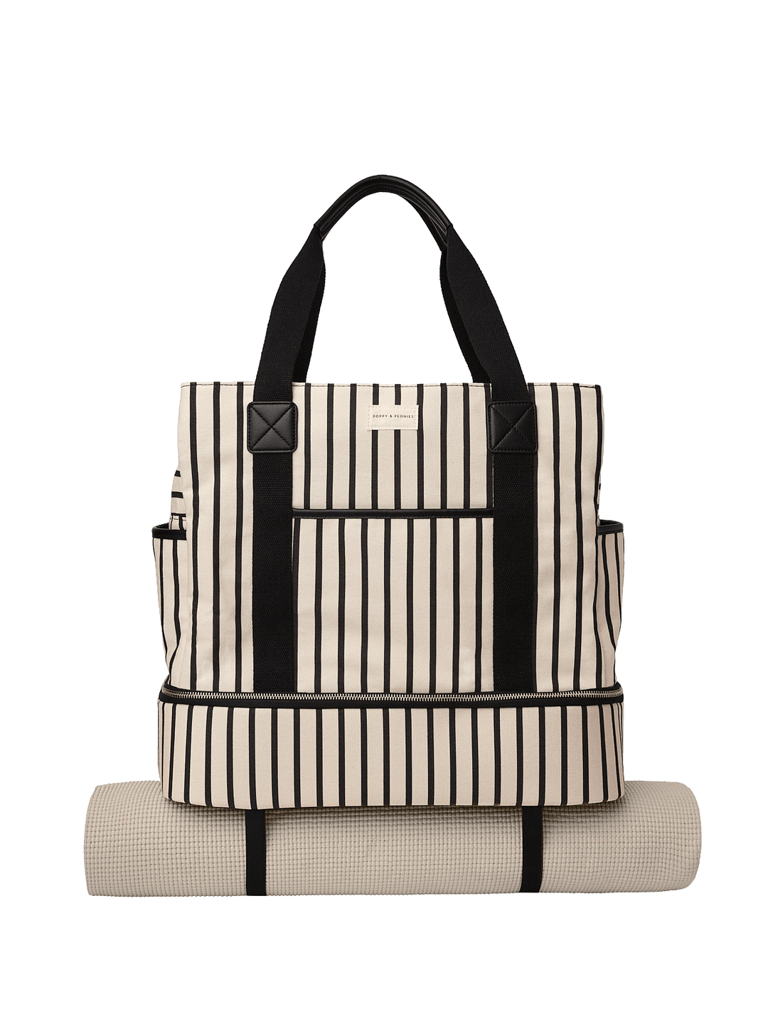 Striped tote bag with black straps and a matching yoga mat attached