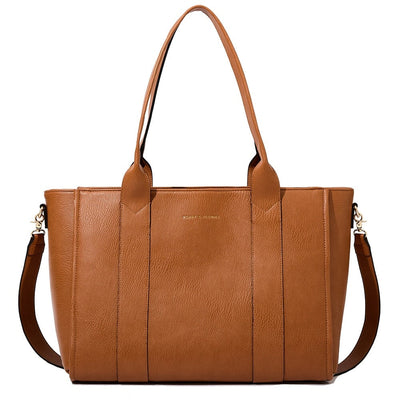 Front of a cognac coloured tote bag on white backdrop