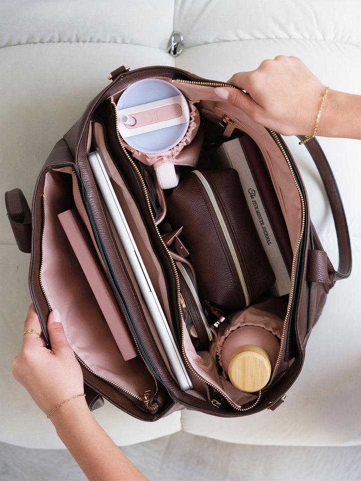 Overhead view of the Poppy & Peonies Double Duty Tote in Espresso packed with everyday essentials and organized interior compartments.